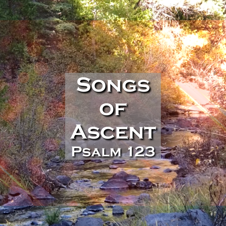 A serene river scene surrounded by autumn foliage, with the text 'Songs of Ascent' and 'Psalm 123' overlaying the image.